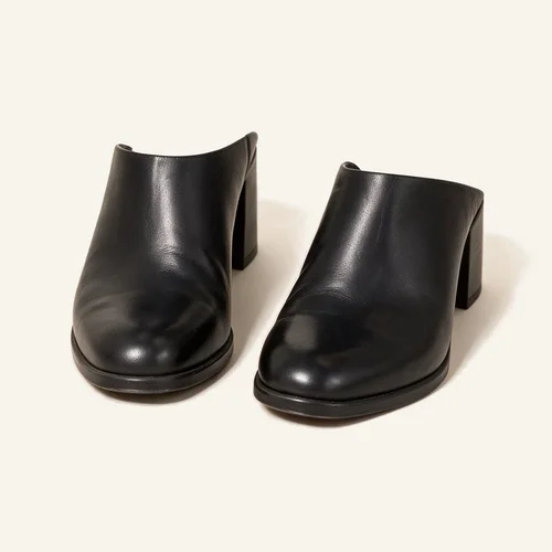 Prepared black ankle boots